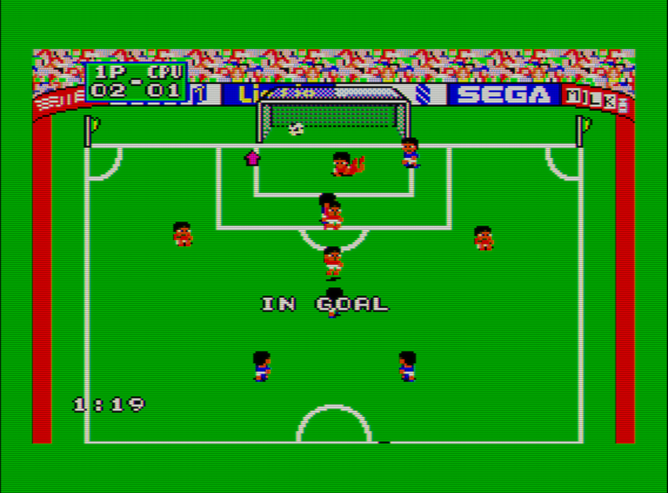 Captura de pantalla del videojuego Great Soccer. En ella se ve a los jugadores del equipo rojo celebrando un gol frente a los del equipo azul. El marcador es 2-1 para los rojos.