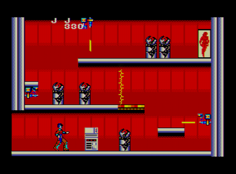 Captura del juego Zillion. En ella el protagonista está en una sala con fondo rojo y se observan tres torretas que disparan hacia él.